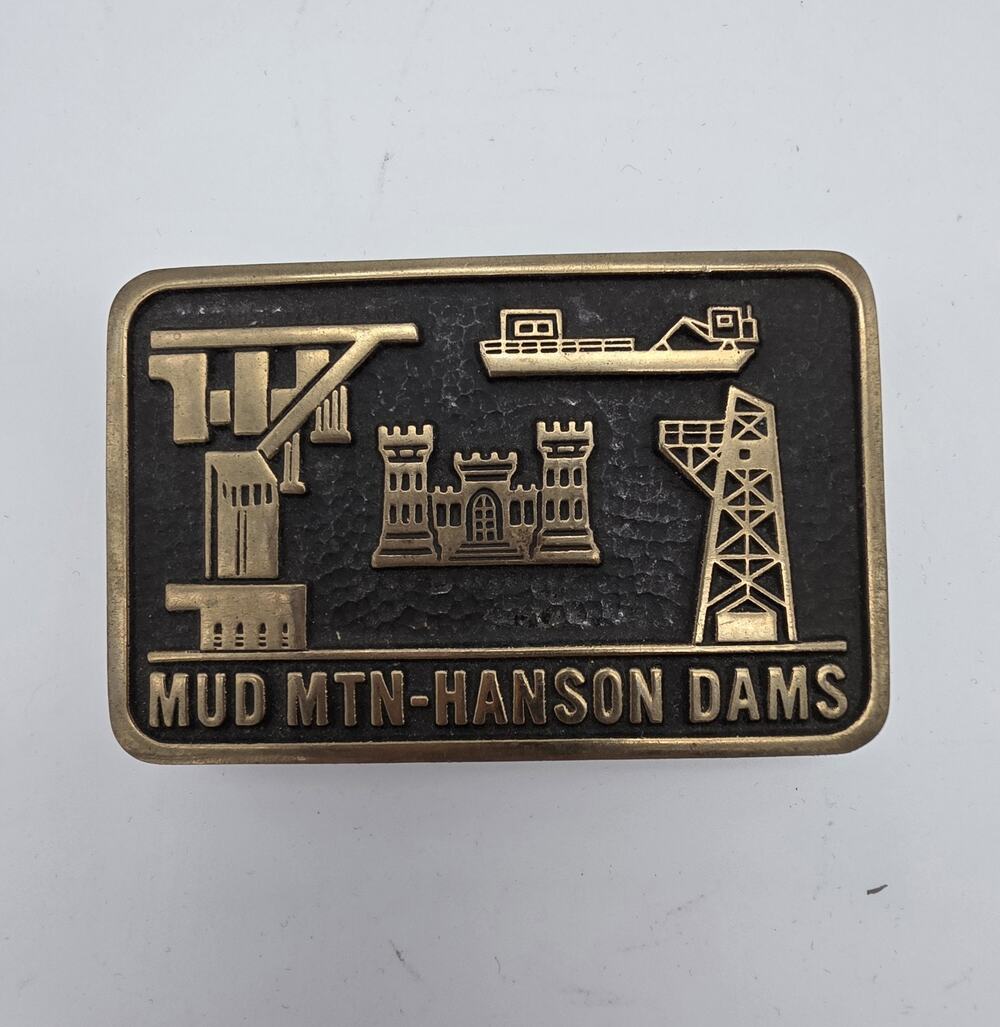 Vintage 1989 Mud Mountain Hanson Dams Solid Brass Belt Buckle USA